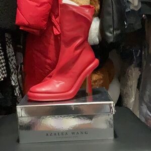 Red booties by Azalea Wang